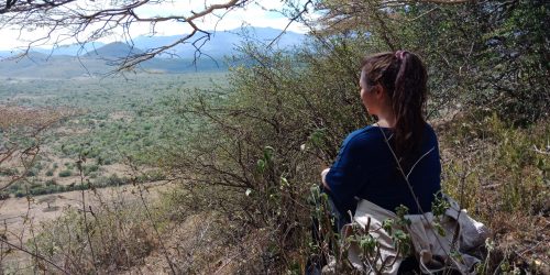 amyra mah looking out into the expanse in kenya